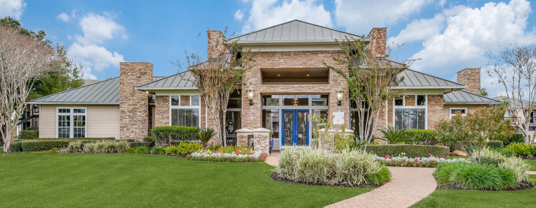 a building with a lawn