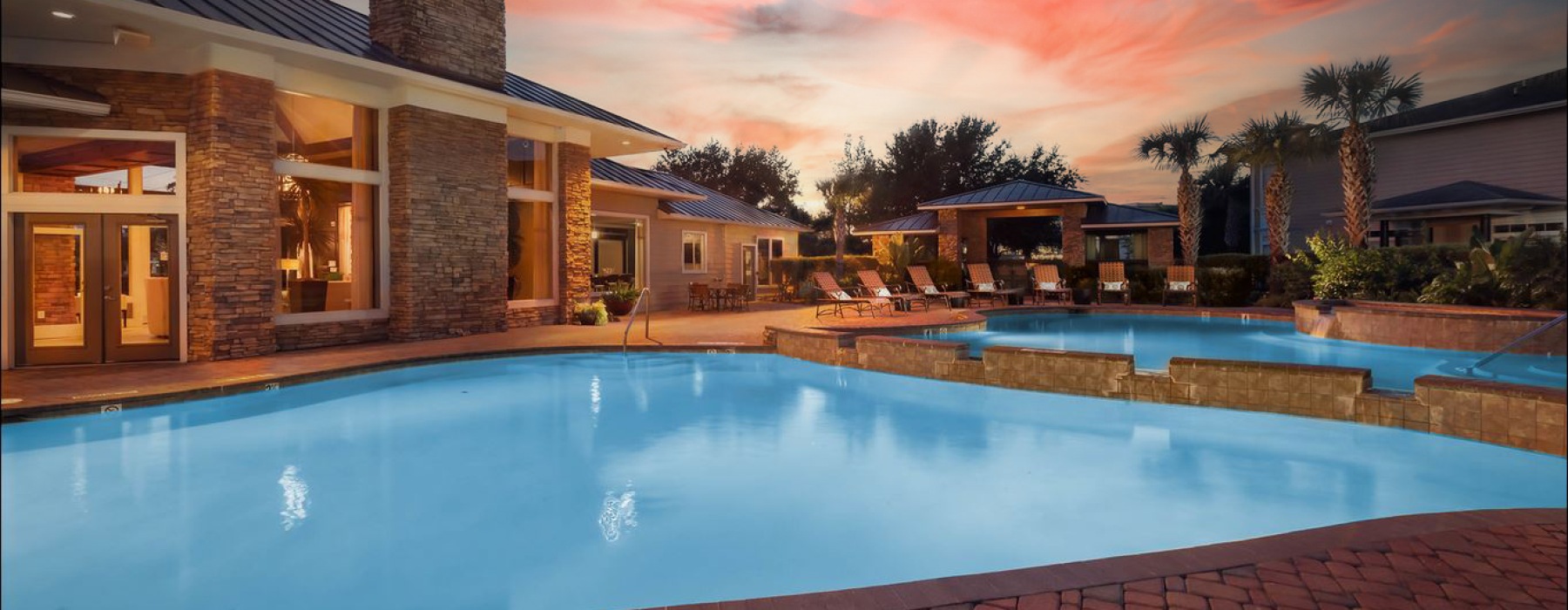 pool with lounge chairs