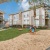 Spacious fenced dog park with agility equipment for residents and their pets at Westmount at Mason Creek.