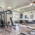 Modern fitness center with treadmills, weights, and strength training machines at Westmount at Mason Creek.